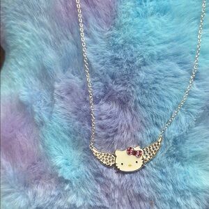 Hello kitty silver like necklace with pink and clear sparkly stones